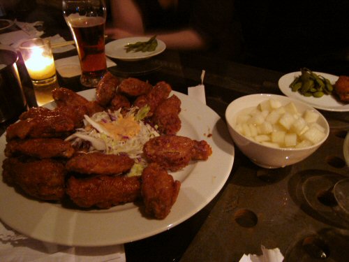 a bunch of food on a plate and cups