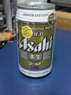 a can of asian beer is on a countertop