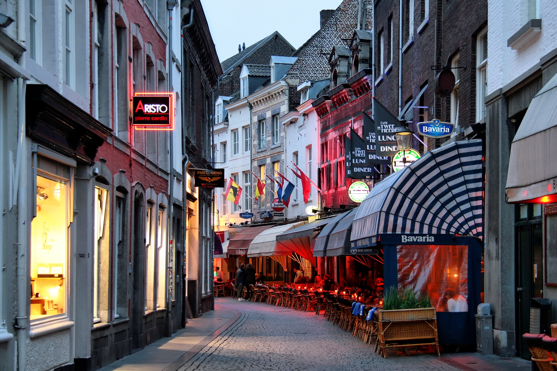 a city street with many buildings on both sides of it