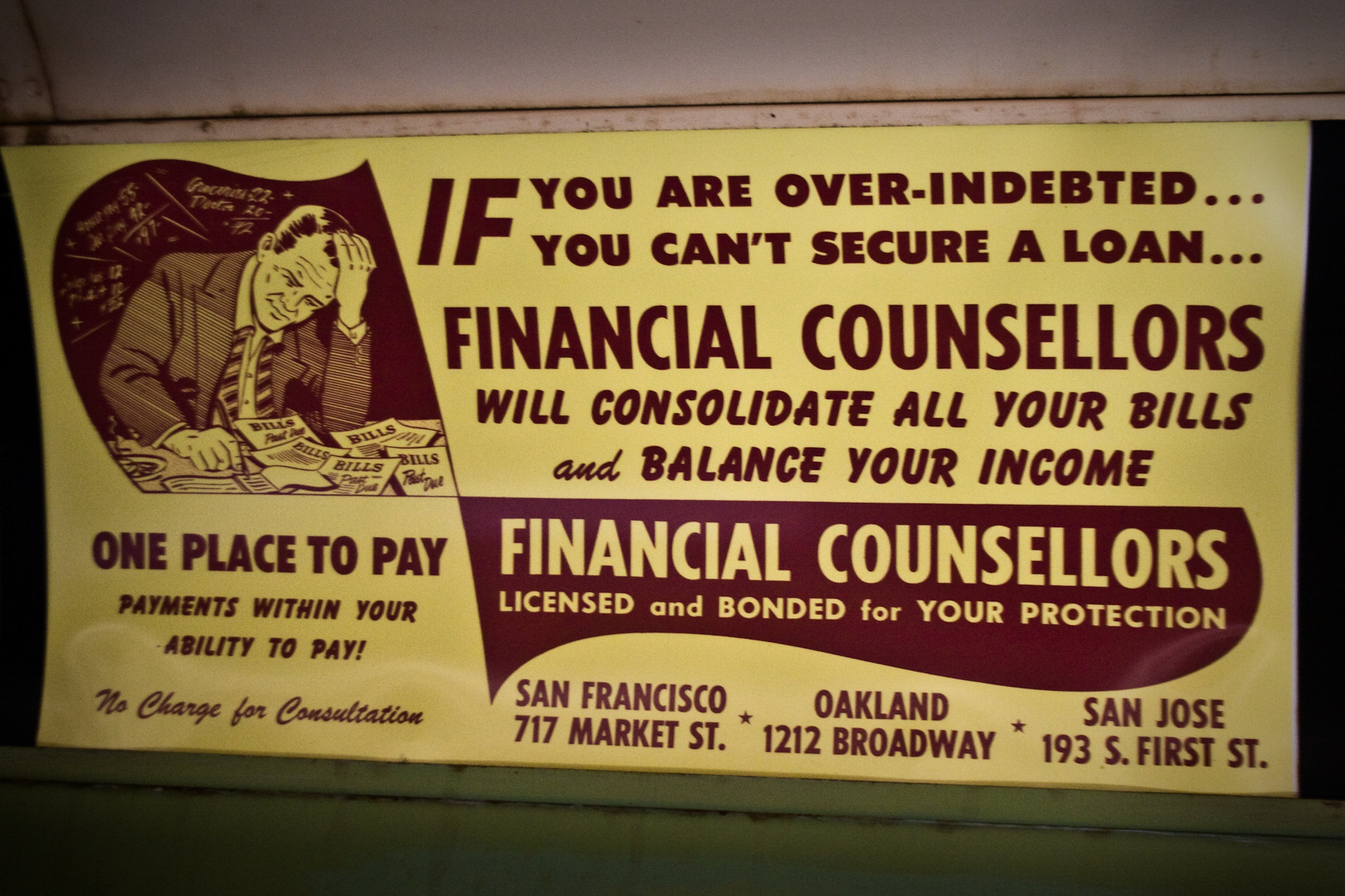 a financial fundraiser sign posted on the side of the wall