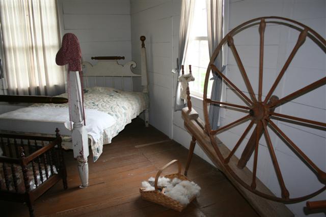 two small children's rooms have been decorated with antiques