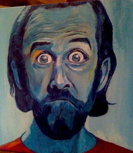 a painting of a man with a beard is in a blue room