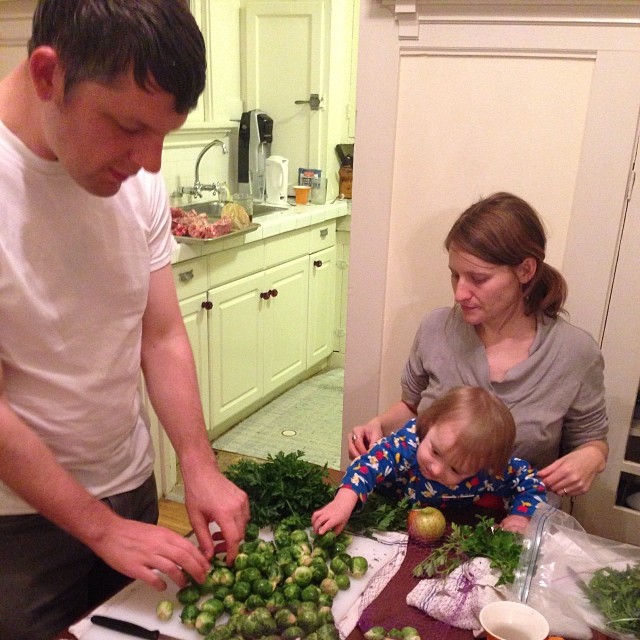 the young man is learning how to cut up vegetables