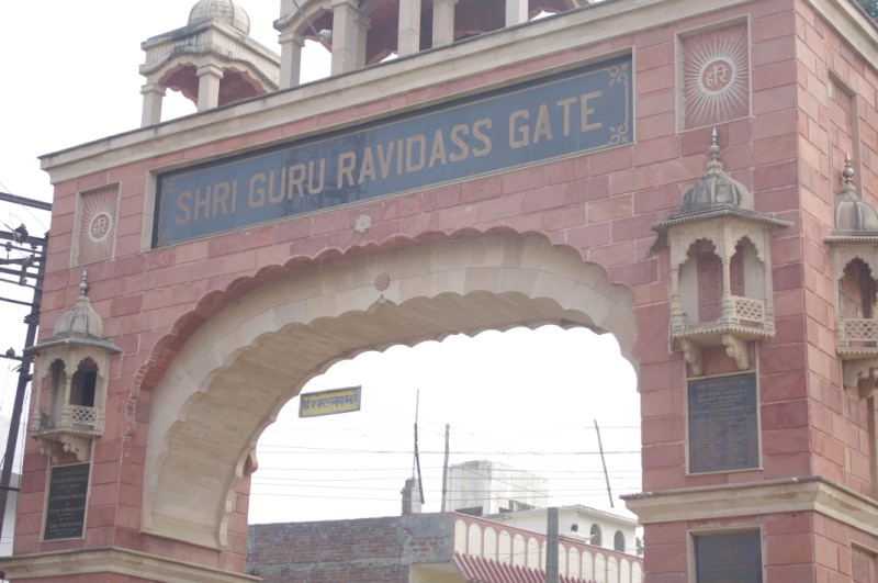 a gate with a clock on the front of it