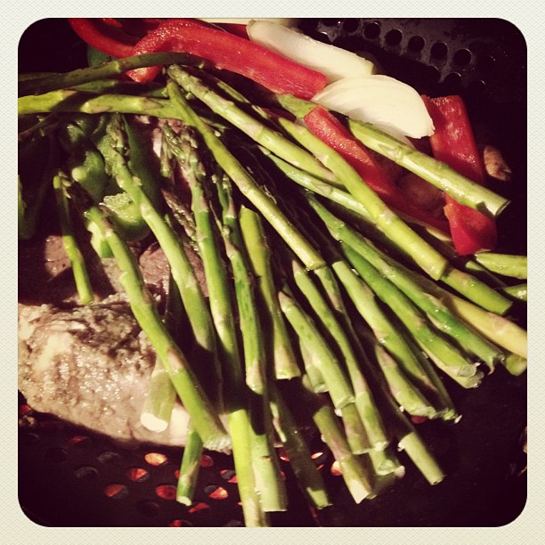 asparagus and red peppers are ready to be roasted