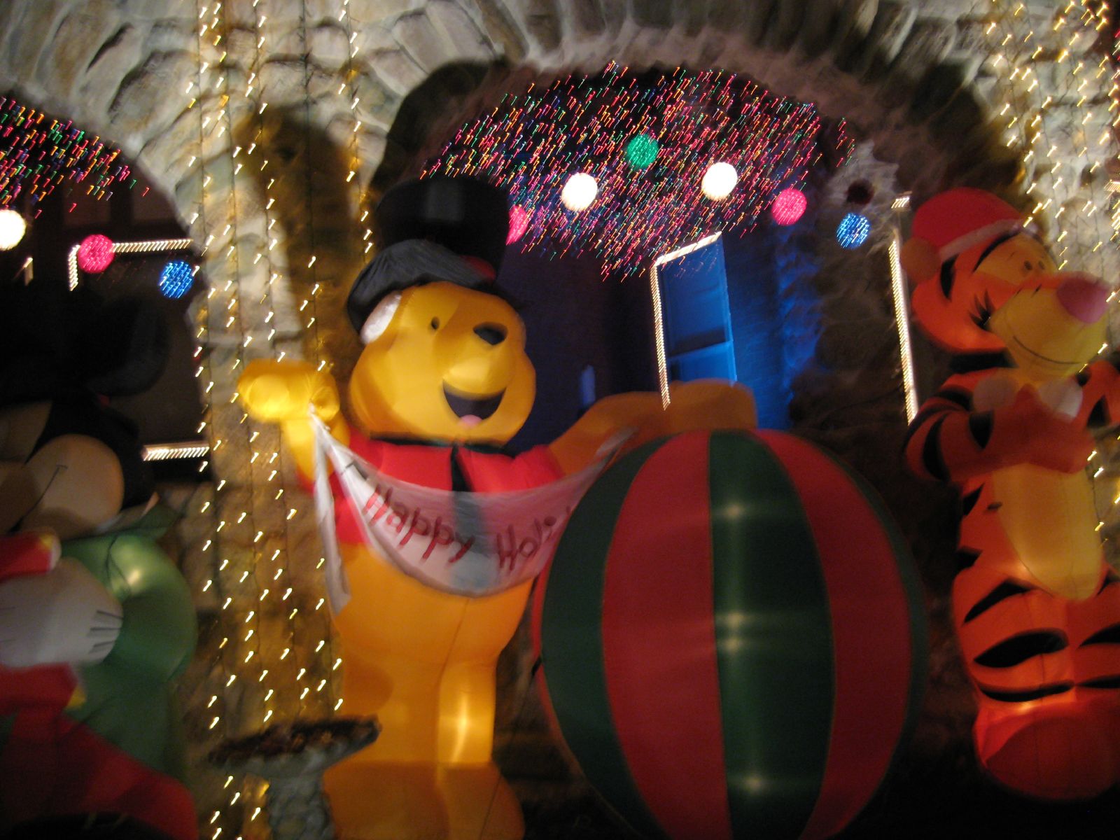 winnie the pooh balloon and its christmas lights