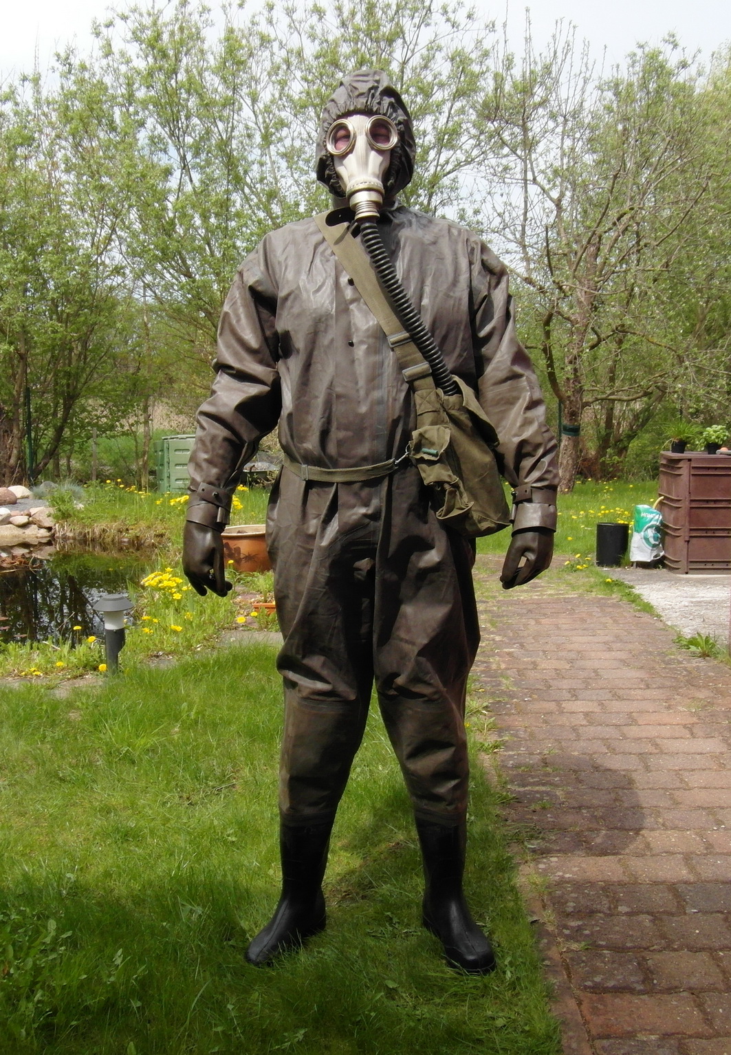 a man wearing a gas mask and diving suit