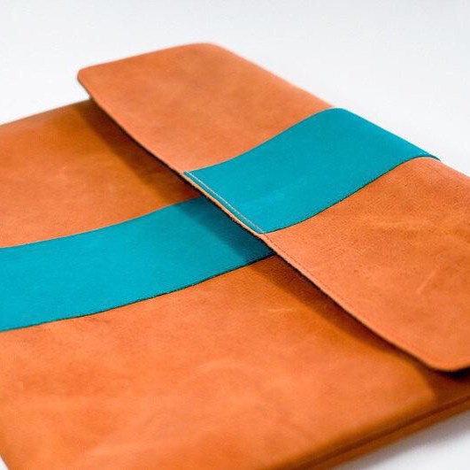 a notebook covered in a handmade leather cover