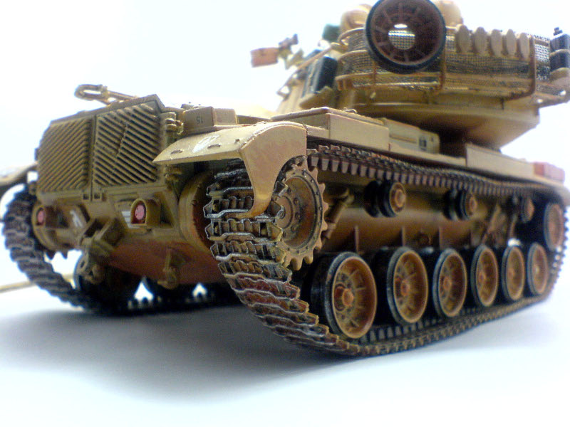 a small toy tank that is on display