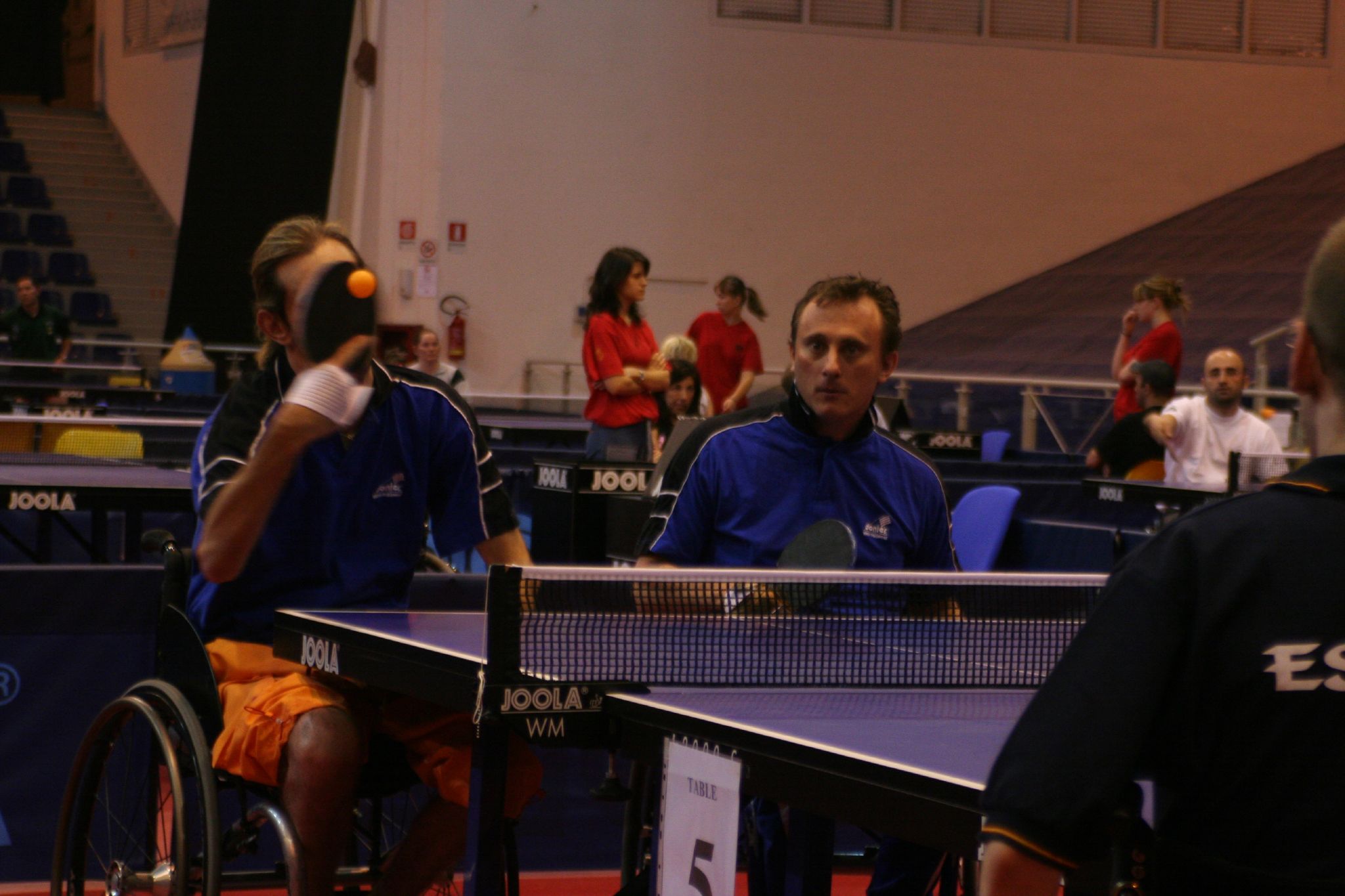 a group of people that are playing tennis