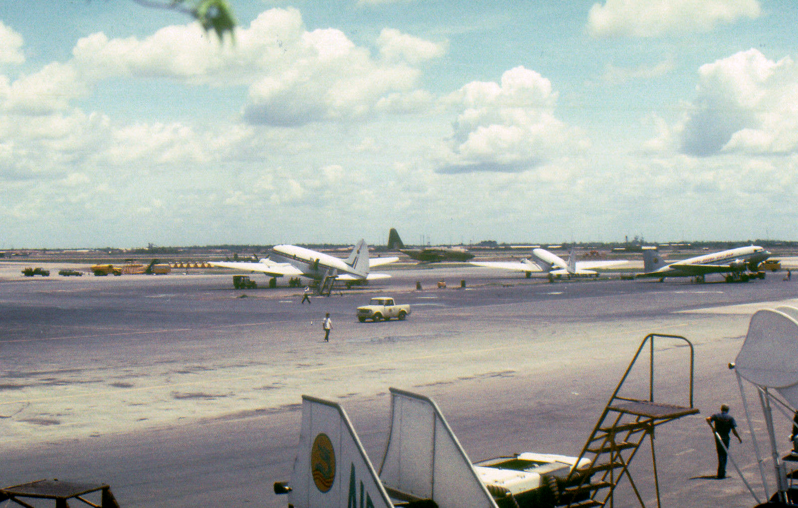 planes are parked on the tarmac at an airport