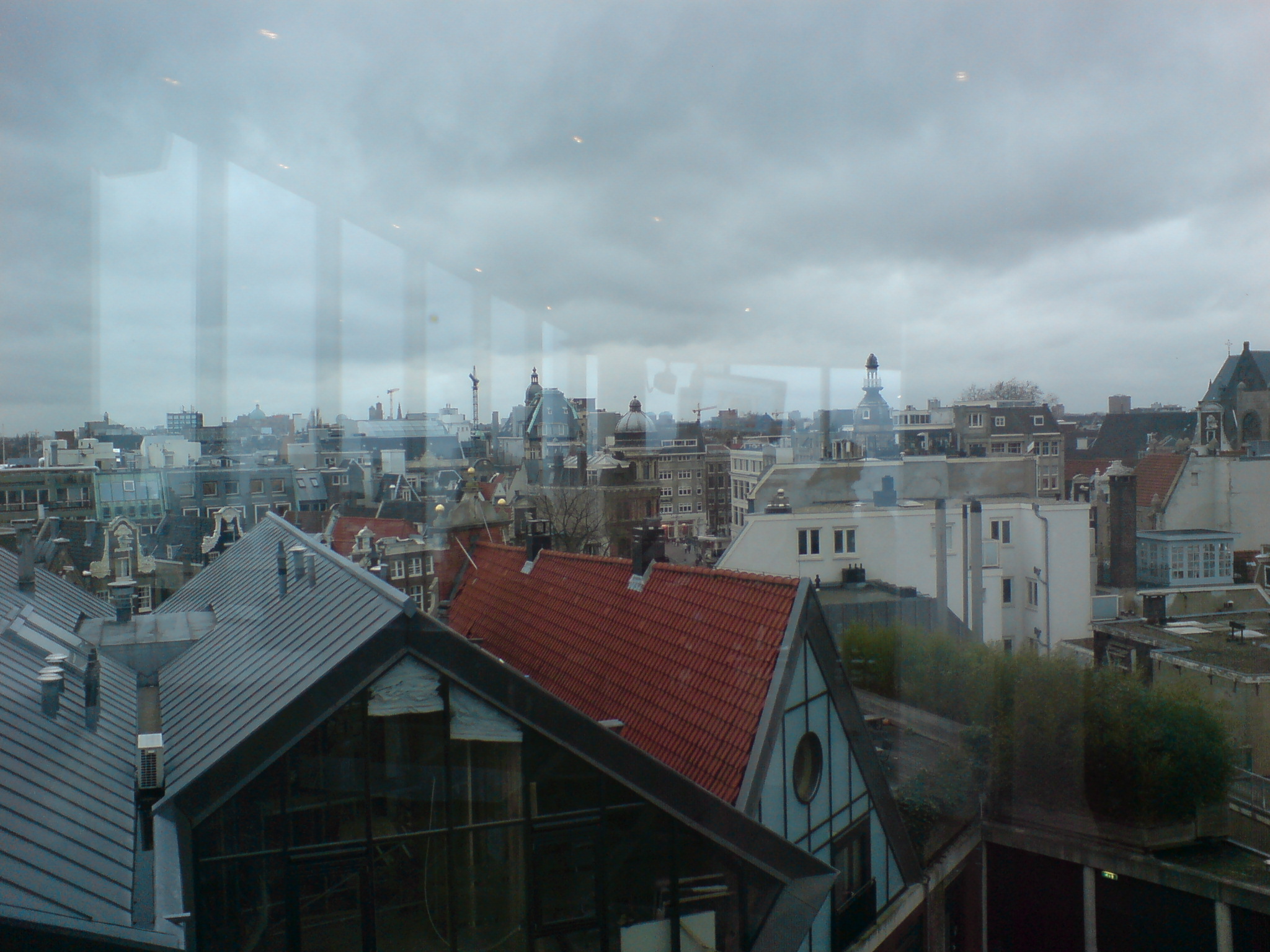 view of a city from the top of a building