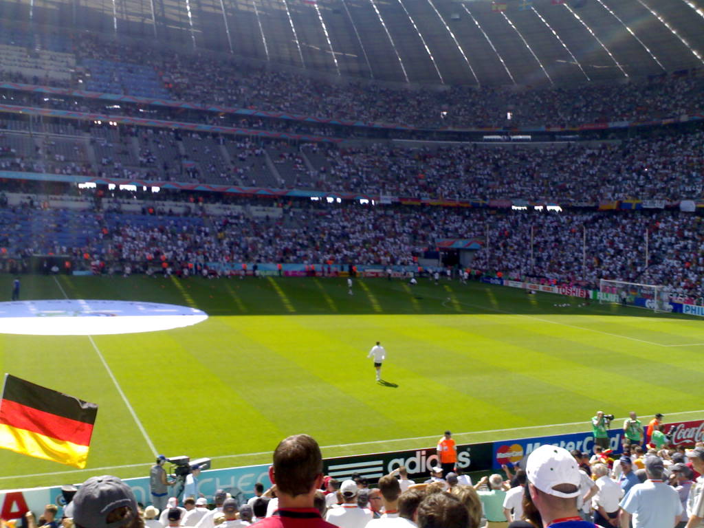 a soccer field that is filled with fans