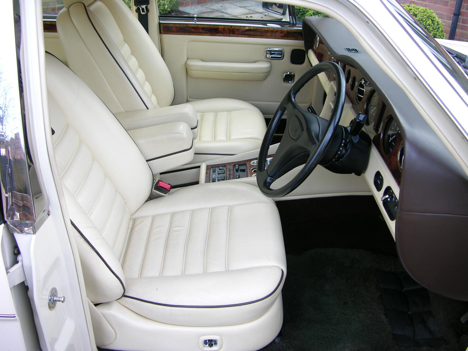 view from the drivers seat of a car with the dashboard in the vehicle