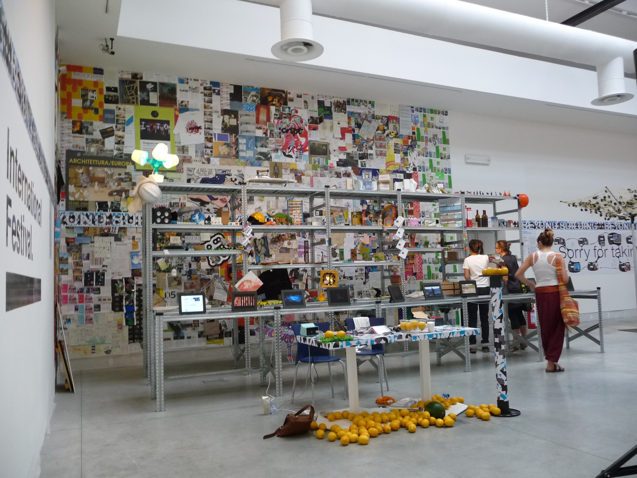 people standing in front of display of books and other books