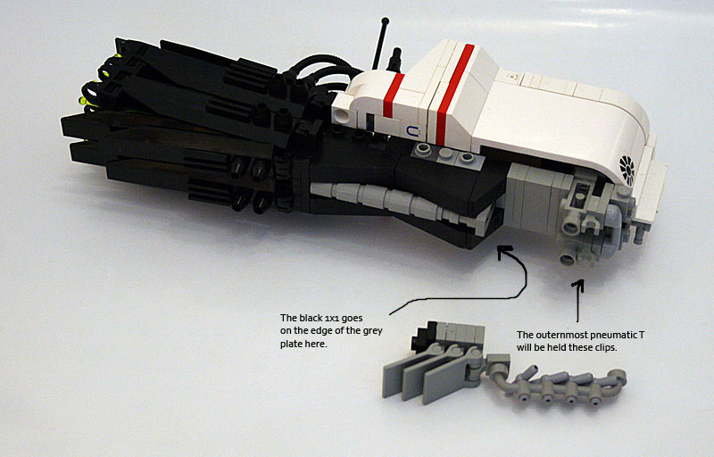 a lego black and white model with instructions on it