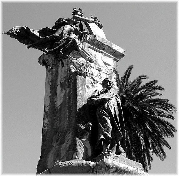 a statue is standing in the sunlight and has a sky background