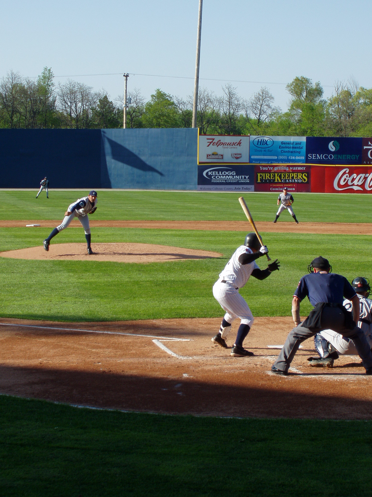 batter taking swing at ball during professional baseball game