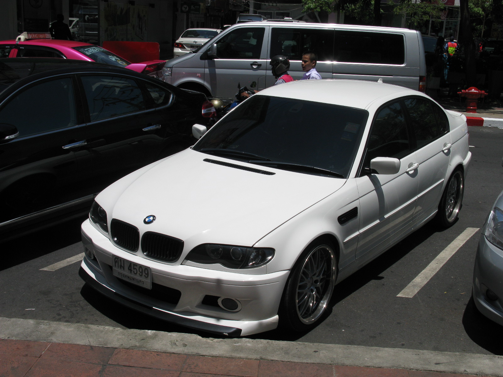 a car parked in the middle of a parking lot