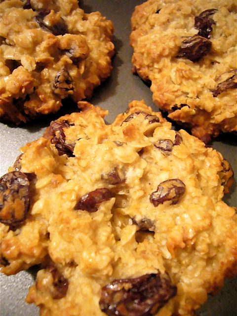 several oatmeal raisins cookies are on a pan