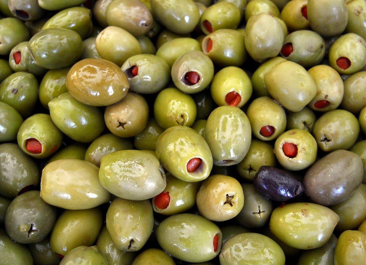 an image of green and yellow olives