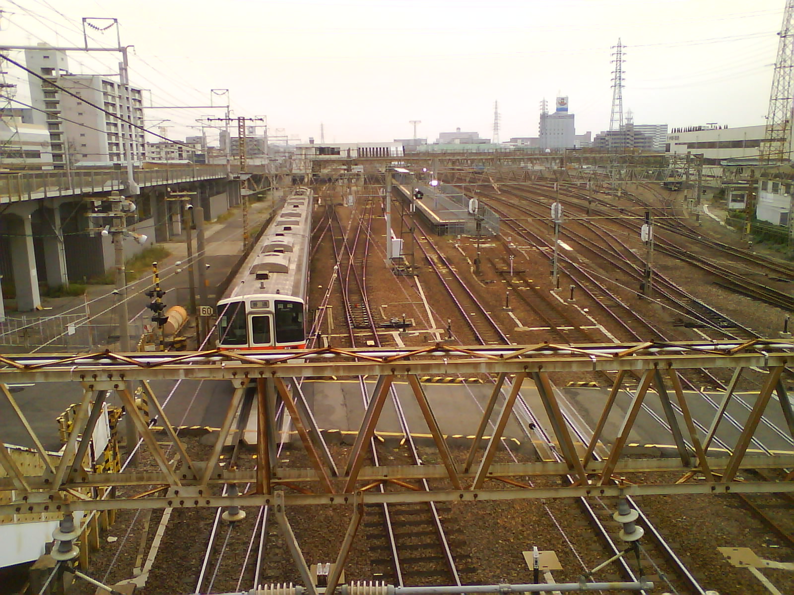 a train traveling through a large industrial area