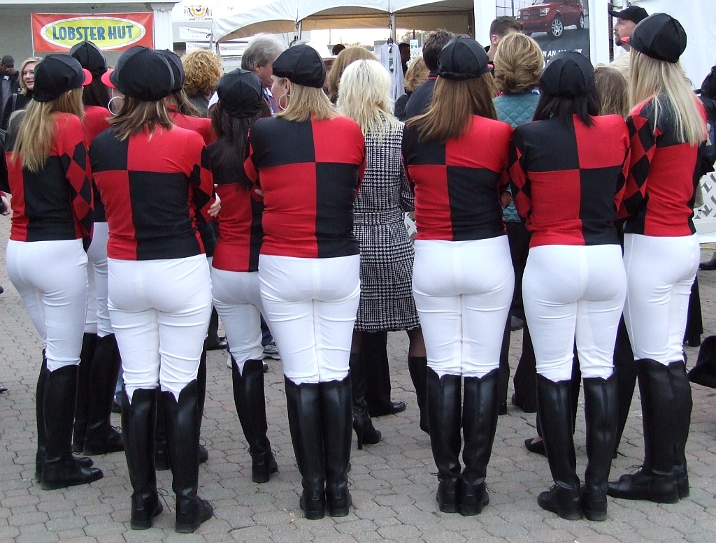 a bunch of ladies in white and red costumes