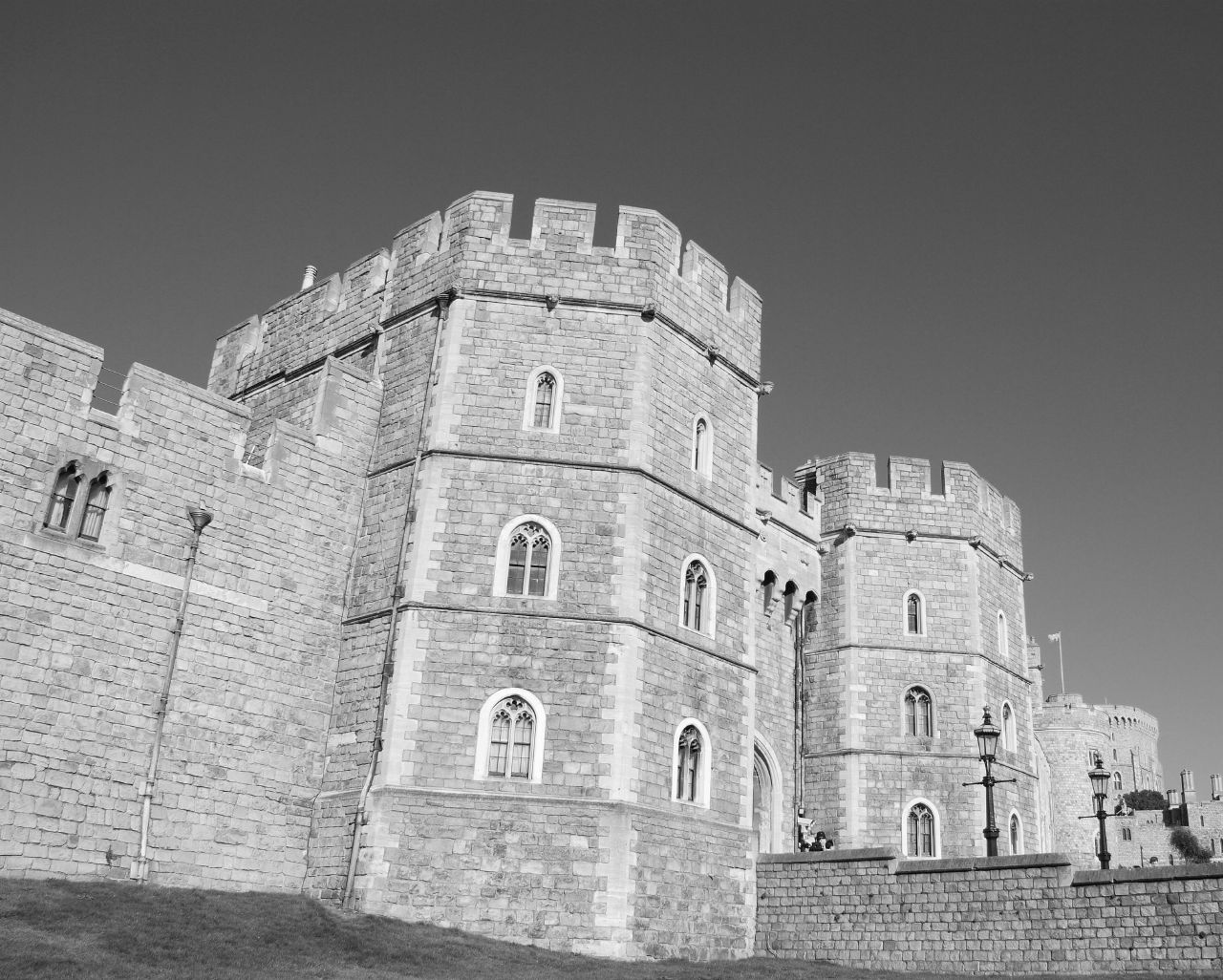 black and white po of a castle against the sky