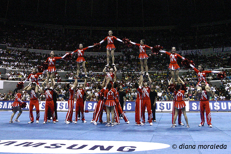 the cheerleaders are on a platform for their routine
