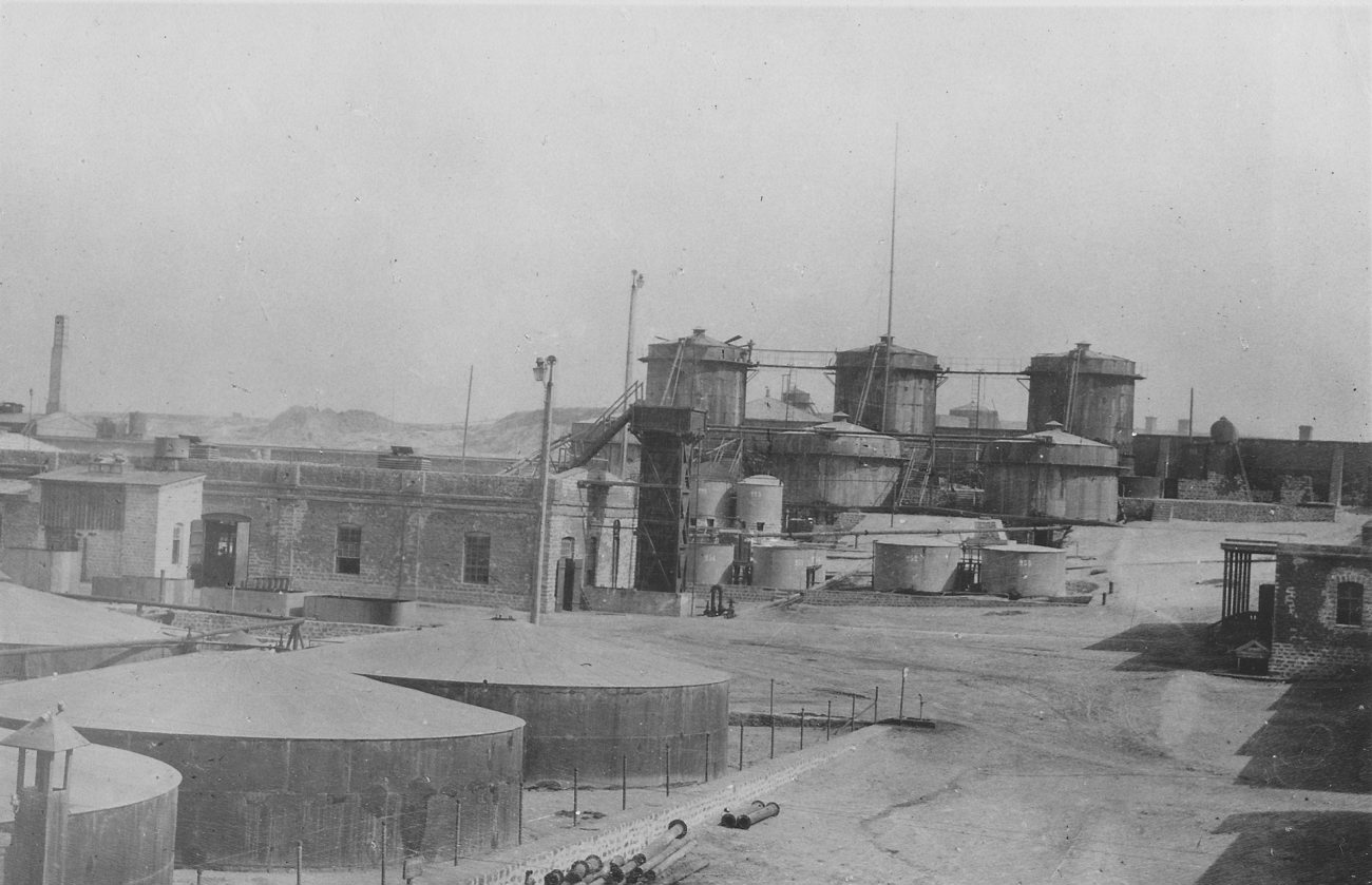 an old po shows several large buildings in a large industrial area