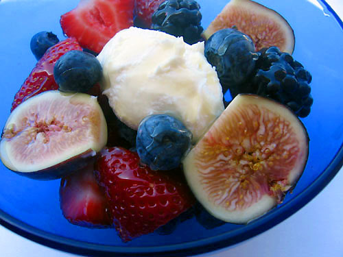 a plate with fruit and cottage cheese on it