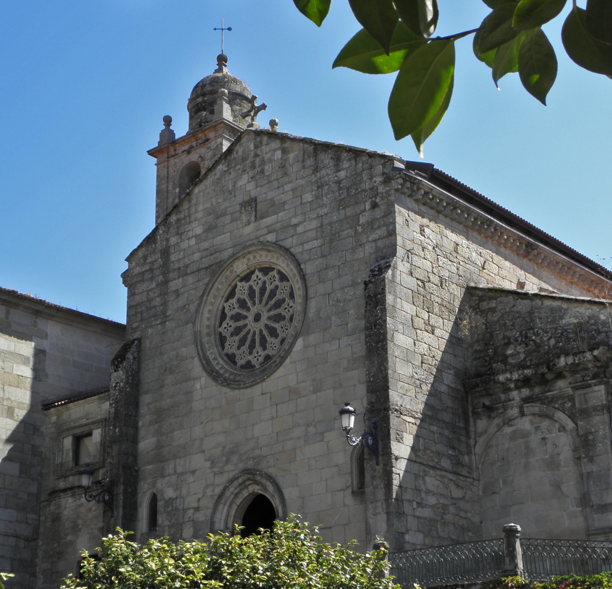 an architectural style church with circular windows and decorative decoration
