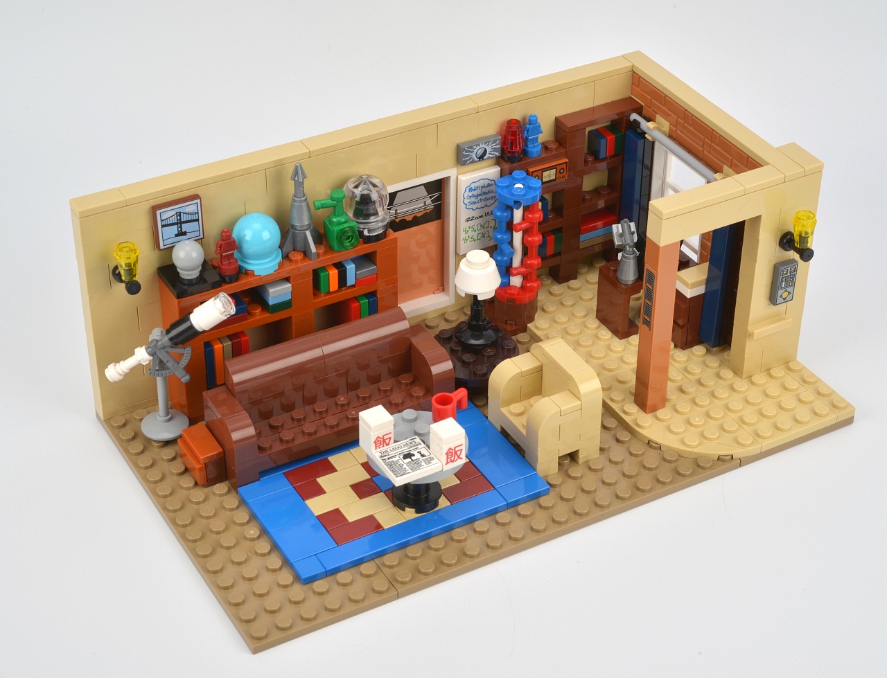 a lego house with a couch and table and television