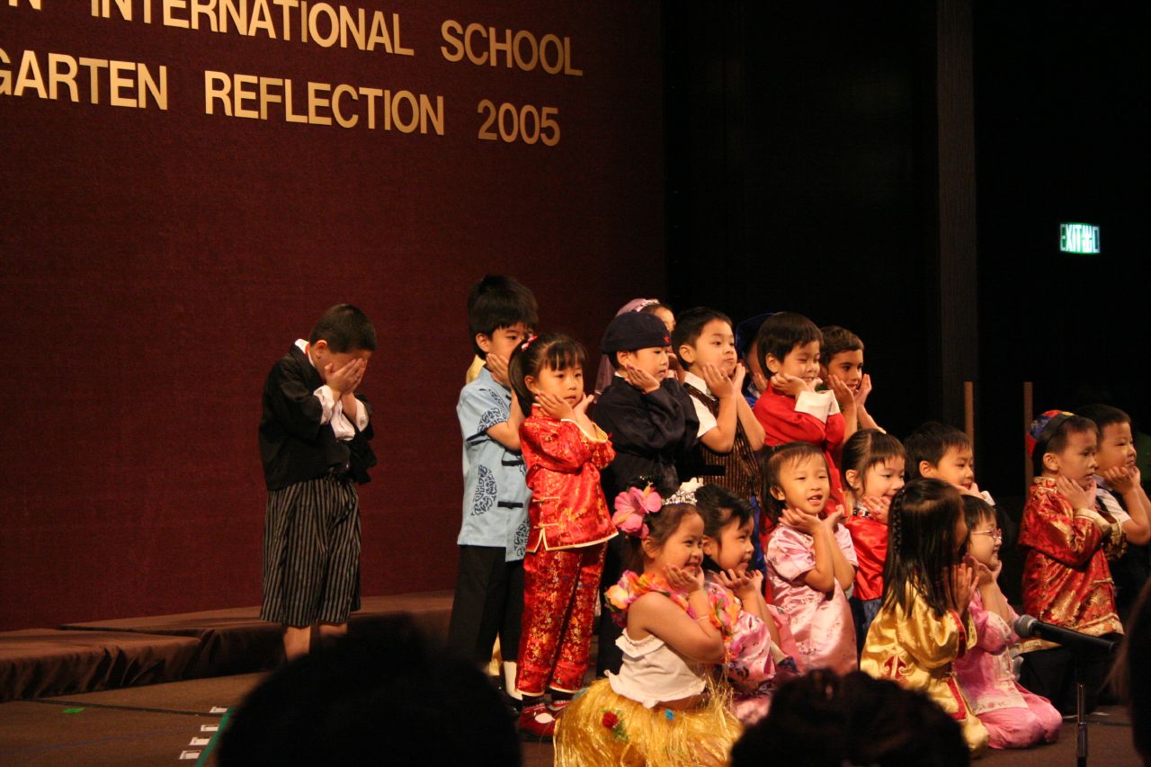 children perform on stage at international school of gauten reflection 2005