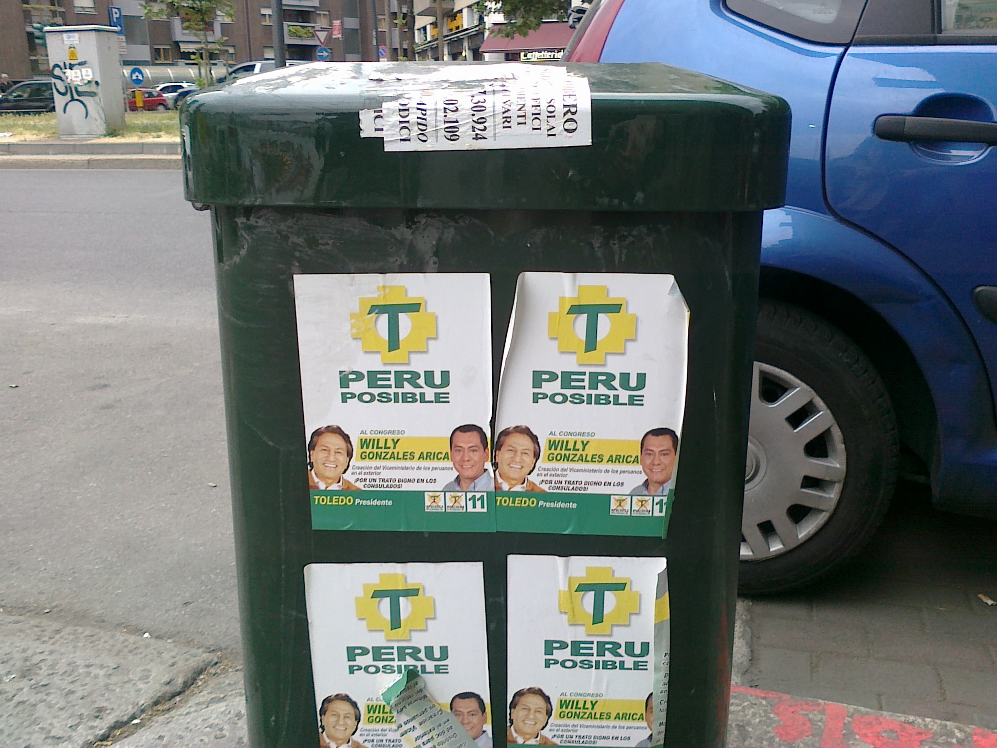 a pile of papers sitting on top of a green box