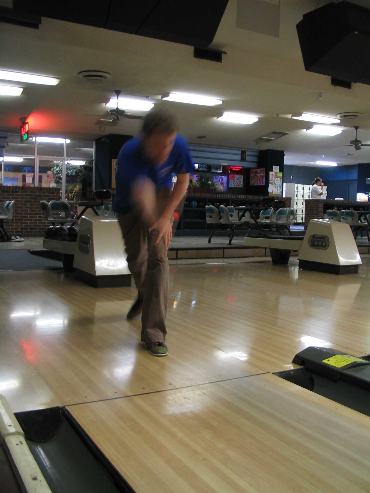 a man is trying to find a good bowling ball