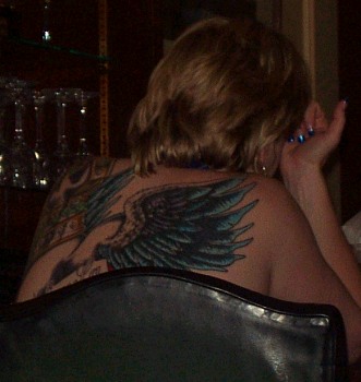 a person that has a tattooed back on