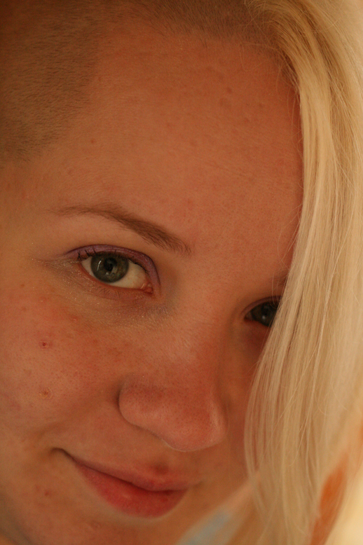 a close up view of a blonde haired woman