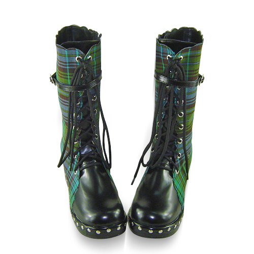 a pair of black and green tartan boots with a chain link detail