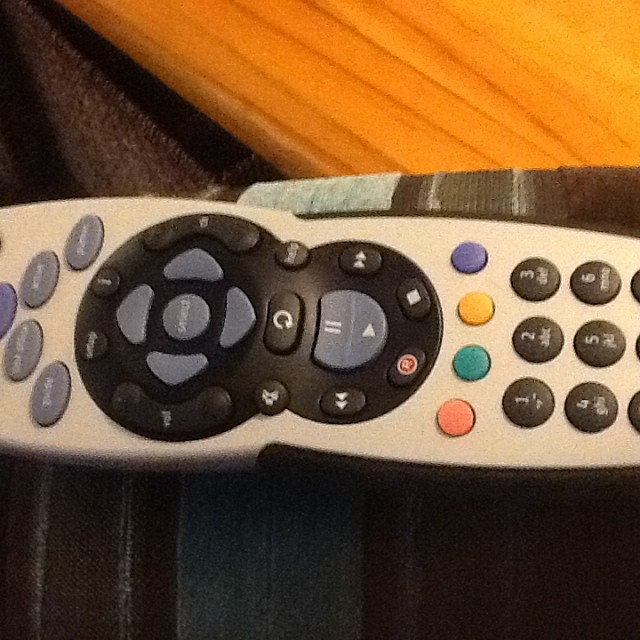 a remote control sitting on top of a table