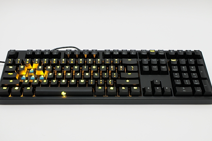 a computer keyboard with lots of illuminated keys on it