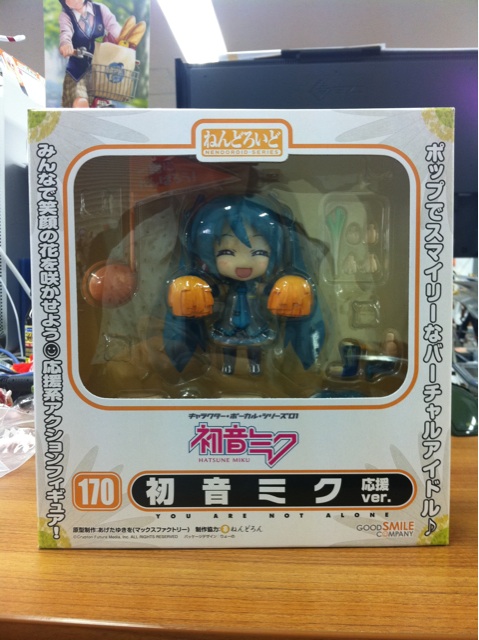 a boxed up box with a figurine of a girl