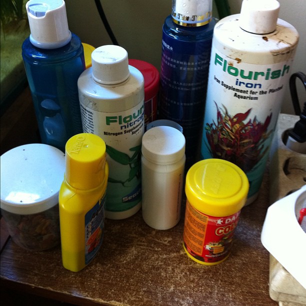 this is an assortment of spray, container, and container on top of the counter