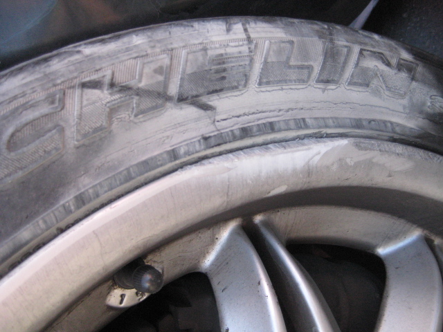 two flat tires facing each other in close proximity