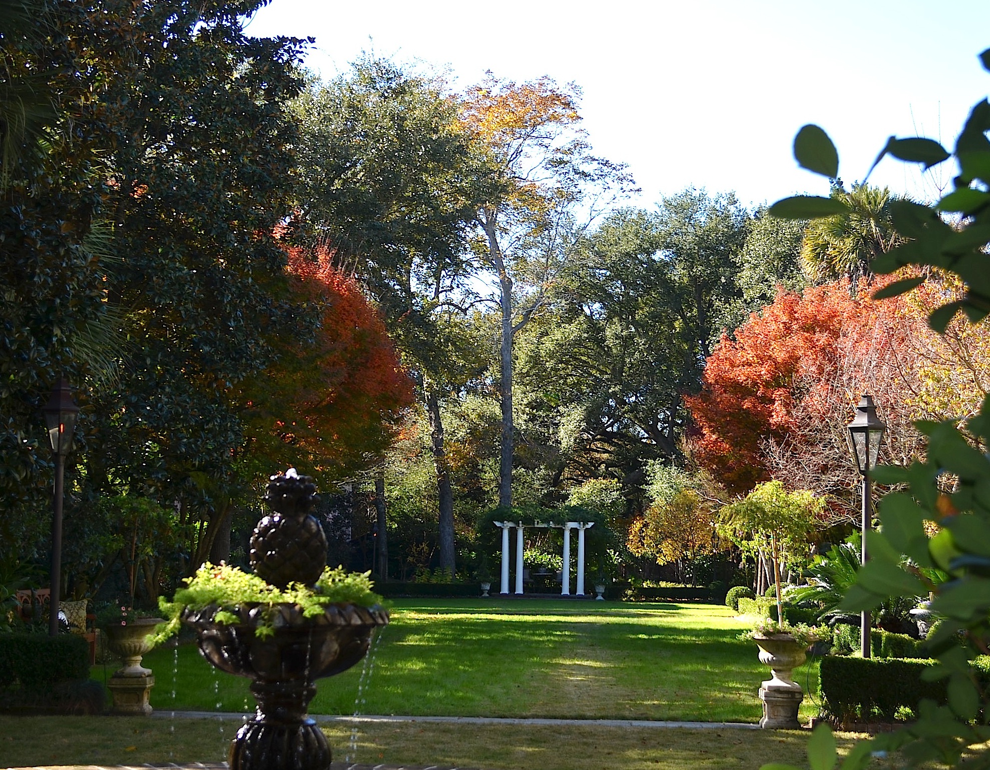 the park area is decorated with colorful trees and benches