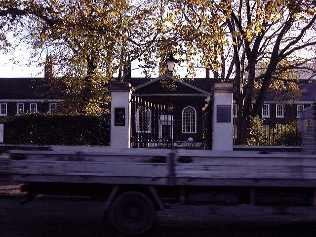 a delivery truck in front of a house