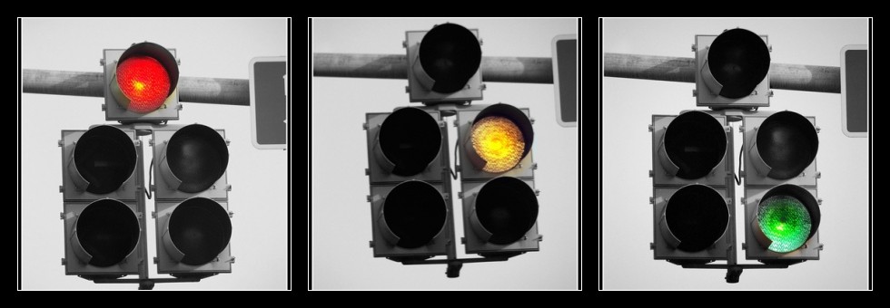 four different views of a traffic signal with various colors