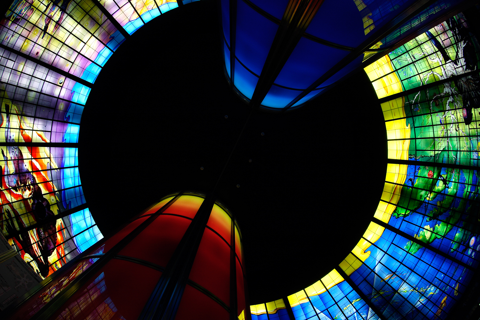 the interior view of a stained glass structure