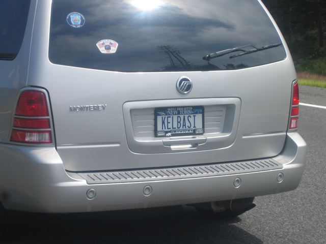 the rear end of a car with an license plate