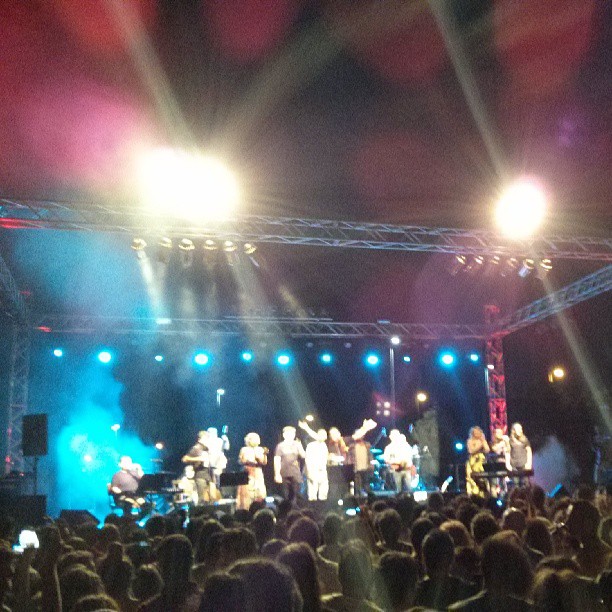 a group of people are on stage performing